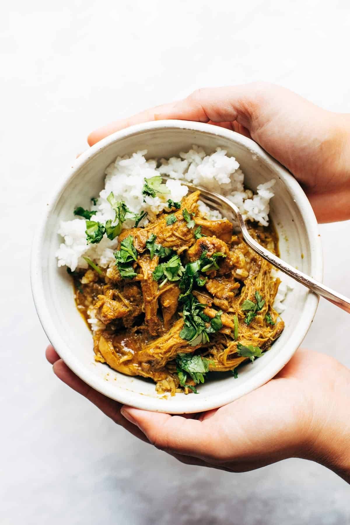 Coconut tandoori chicken in a bowl with rice.