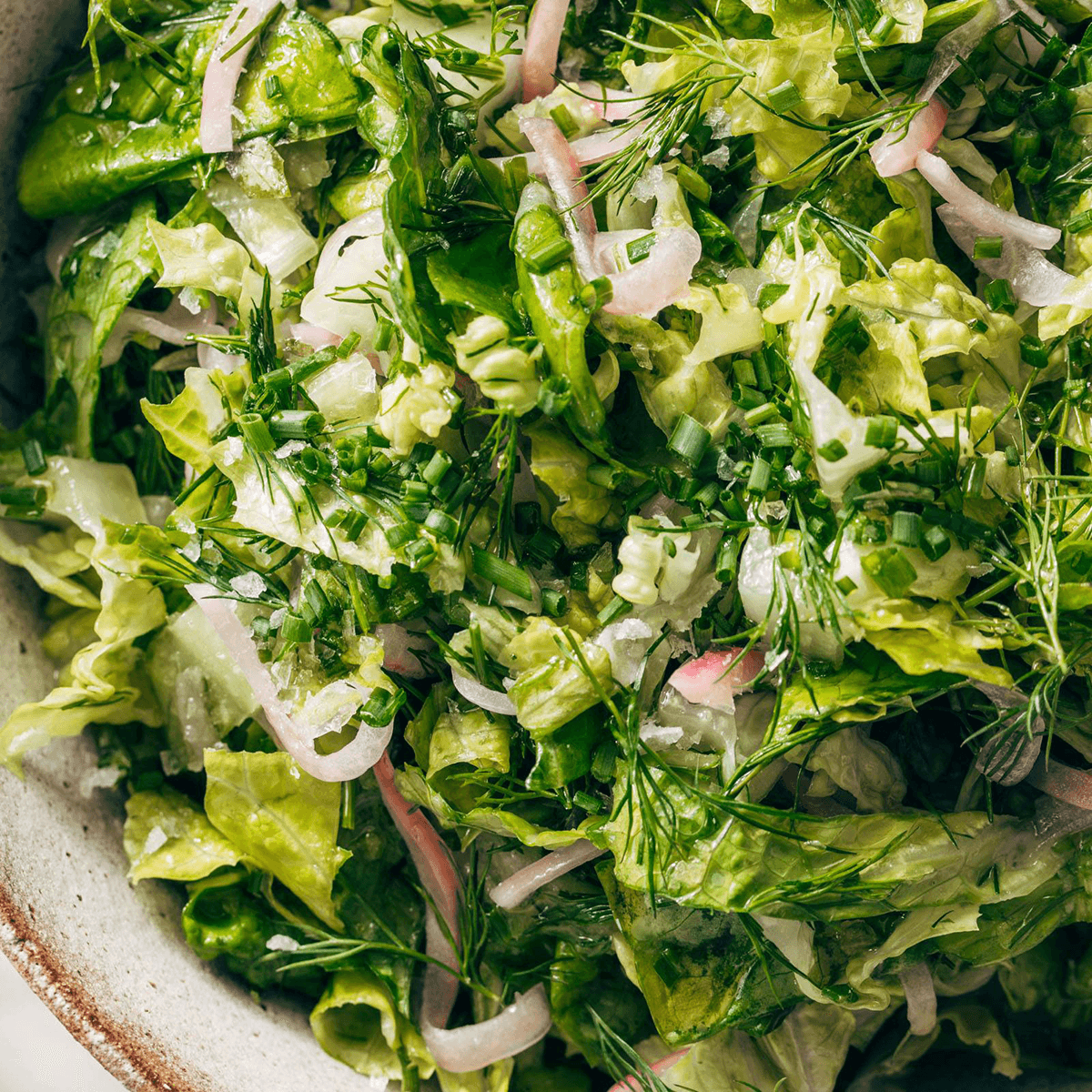 Bistro salad in a serving bowl.